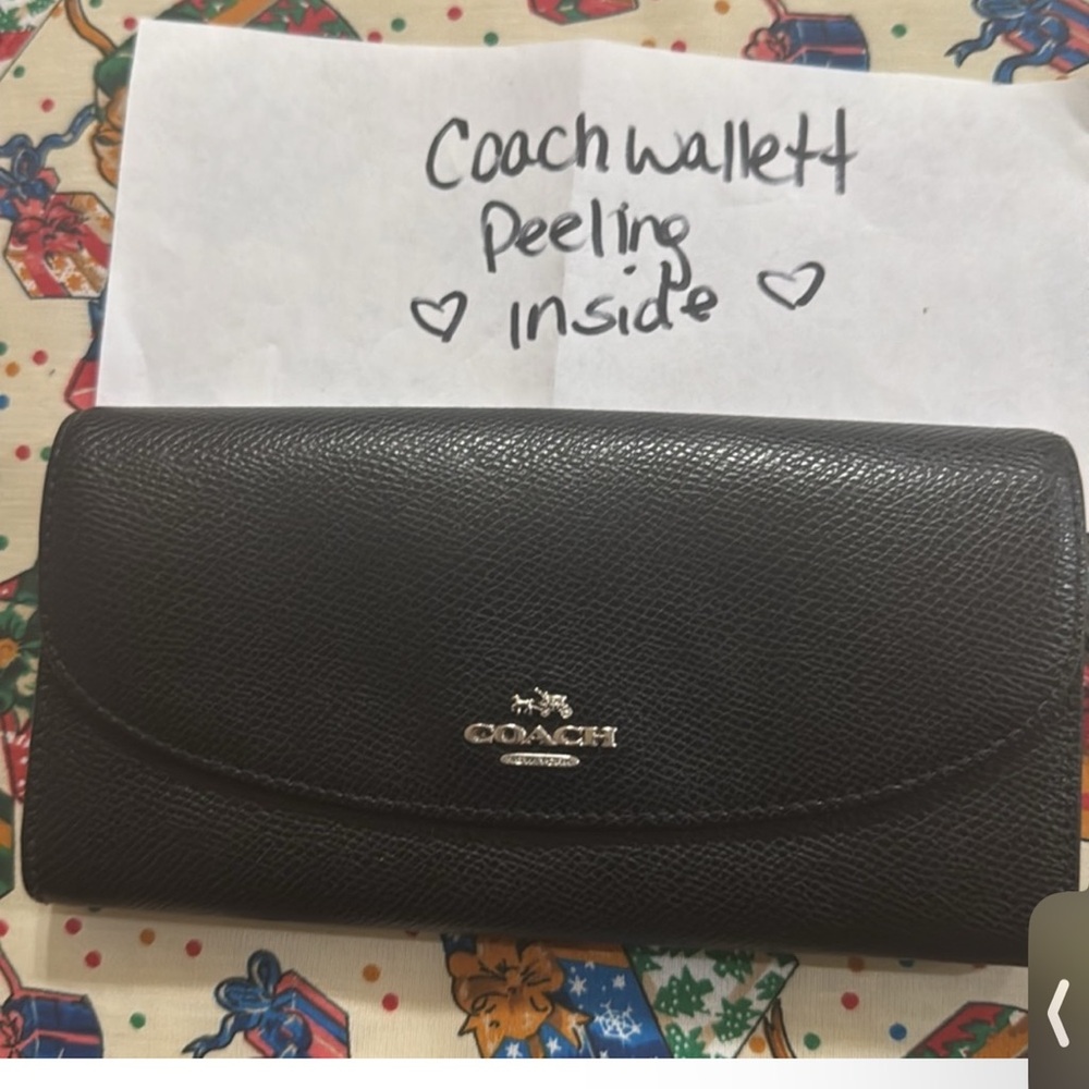 Coach black leather wallet with imperfections